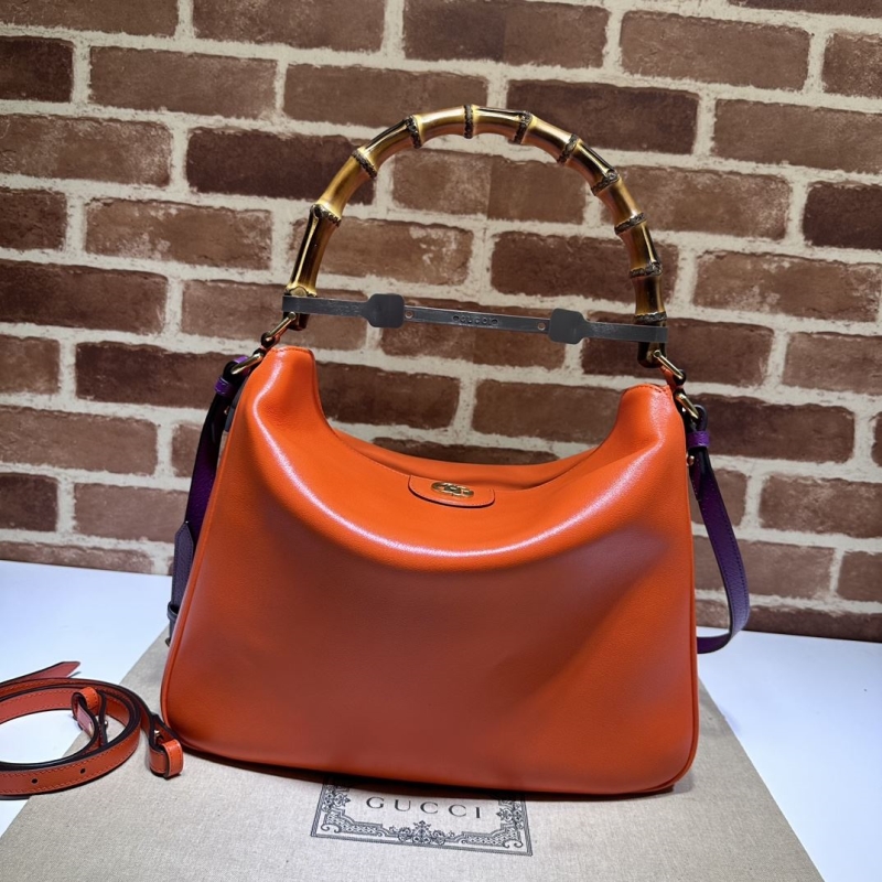 G*u*i top handle bags